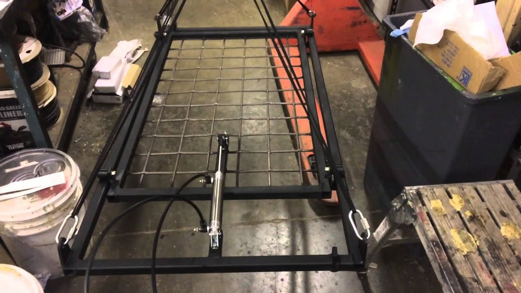 Pneumatic mechanism designed to be hung from chains in a kitchen scene, and when activated, will bang all the pots and pans together while moving 4" back ...