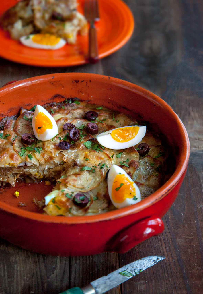 This classic bacalhau à Gomes de Sá, or Portuguese salt cod-potato-onion casserole, is authentic in all ways but one: Instead of peeling, boiling, and cutting the potatoes, they’re very thinly sliced, layered in the dish, and cooked in the oven.